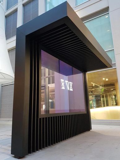 Anodised aluminium, display screen, canopy structure.