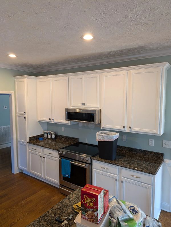 Cabinets painted white updated in Fayetteville NC