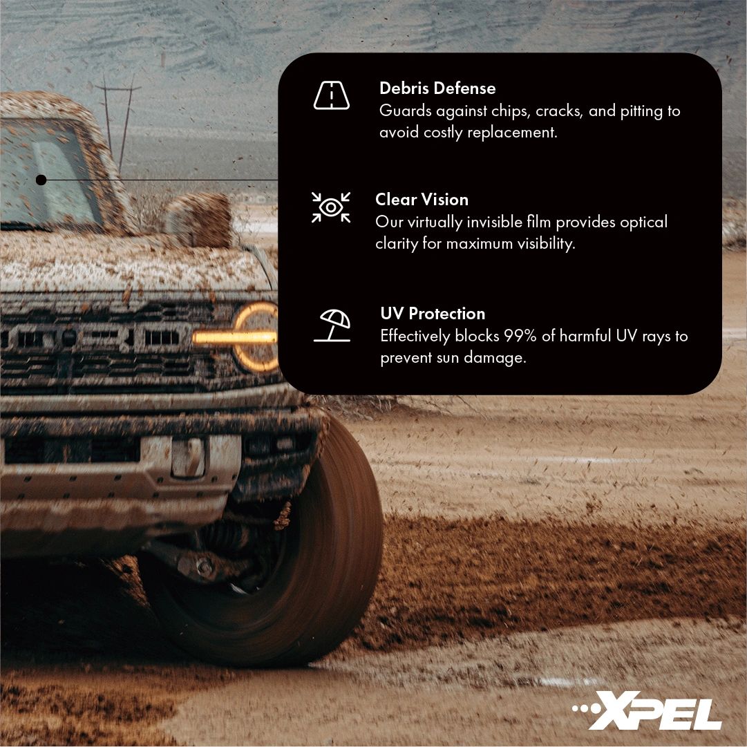 Mud-covered truck showcasing XPEL film benefits: debris defense, clear vision, and UV protection.