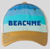Cap with the word BEACHME in blue.