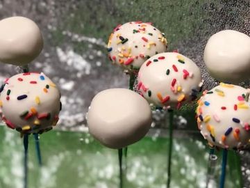 Yummy cake batter, cake pops - dipped in chocolate, then painted with your choice of colors, sprinkl