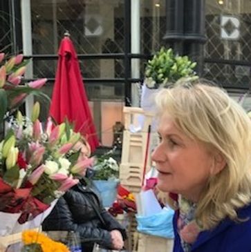 Suzanne Faith selecting flower colors for energy healing