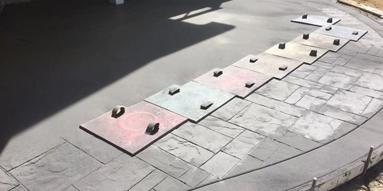 Resin driveways near Exmouth tarmac surfacing cobblestone paving contractors concrete solutions
