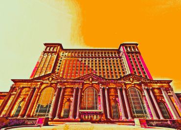 Historic building with an orange sky.