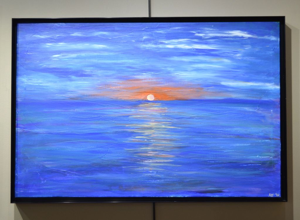 Painting of a sunset over the ocean with blue and orange hues.