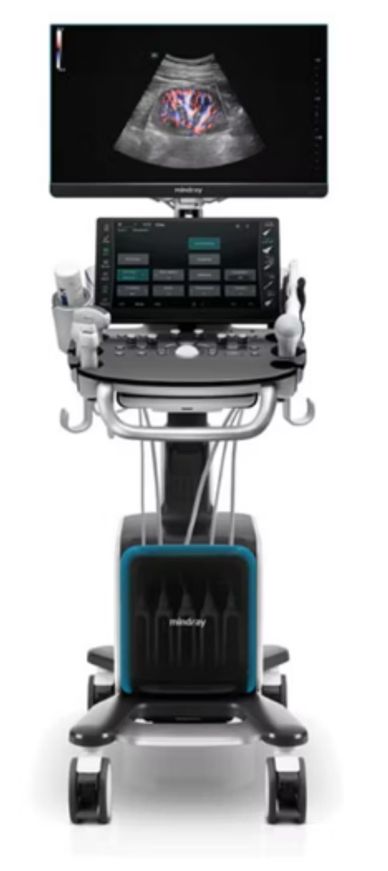 Modern ultrasound machine with color Doppler imaging on screen.