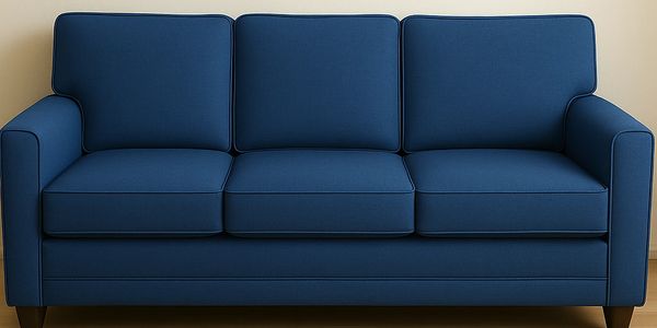 A blue three-seater sofa.
