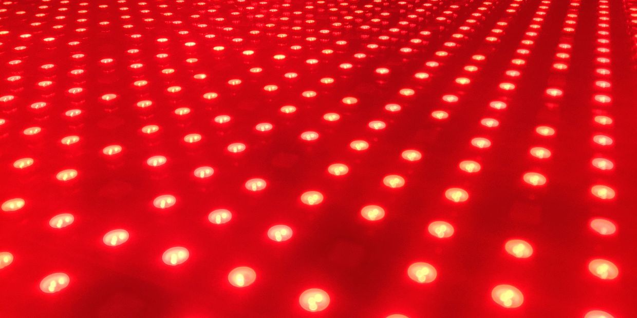 Grid of illuminated red and yellow lights.