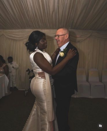 Couple dancing at a wedding reception.