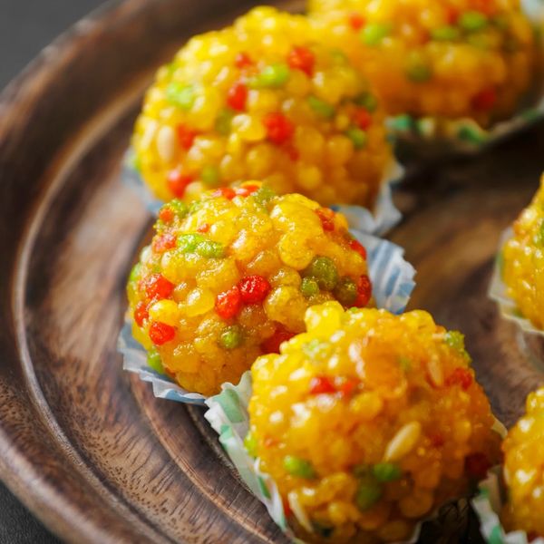 The incredible journey of a Tirupati Laddu Prasadam from Tirumala to its destined devotee.