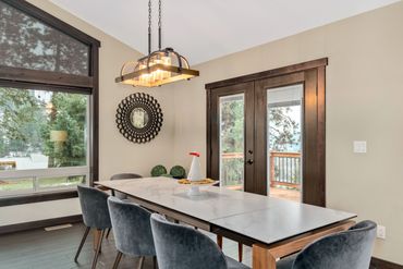 Dining room table expands to seat 10