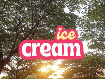 Sunset behind trees with an 'ice cream' text overlay.