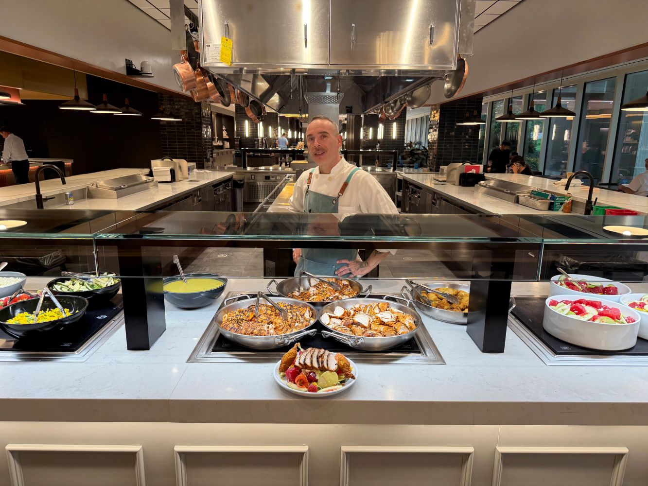 Chef Joseph is preparing food in a professional kitchen.