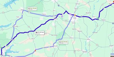Map showing three driving routes between two locations with different travel times.