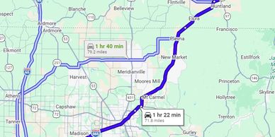 Map showing two driving routes with different times and distances.