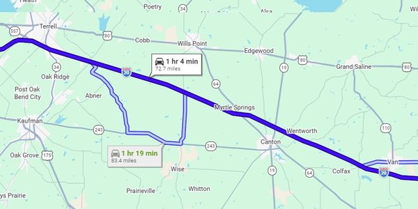 Map showing two driving routes with different durations and distances.