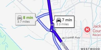 Map showing two driving routes with estimated times and distances.
