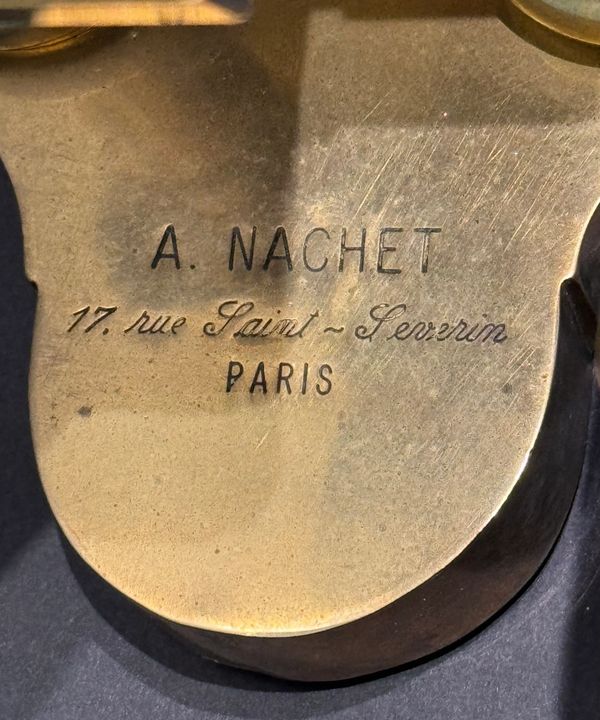 Engraving of 'A. NACHET, 17 rue Saint-Severin, PARIS' on a brass surface.
