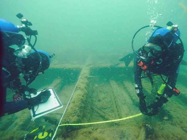 Two divers do underwater research