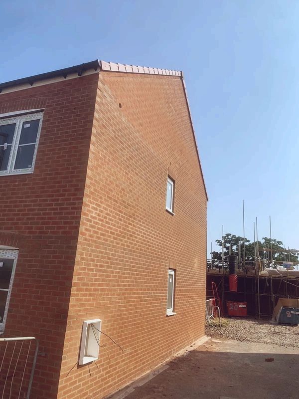 Side view of a gable end on a pair of houses.