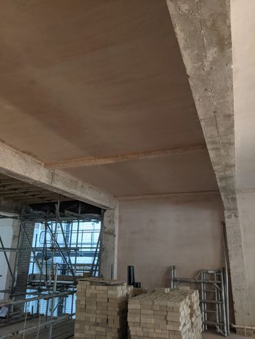 plastered and polished ceiling on a building site work carried out by hall brothers plastering