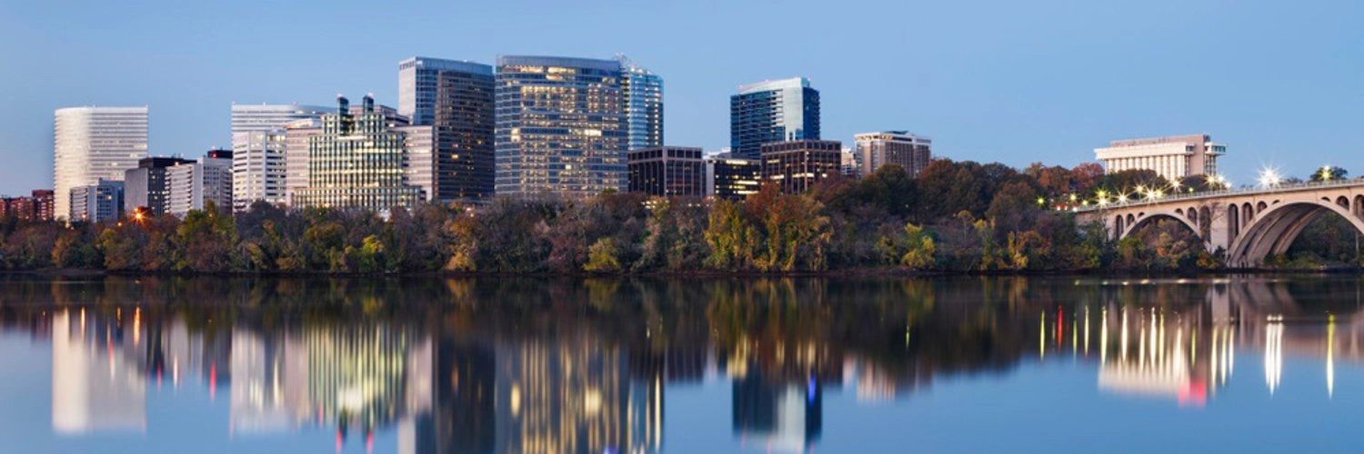 Rosslyn Virginia skyline on the banks of the Potomac River as viewed from Georgetown, Washington DC.