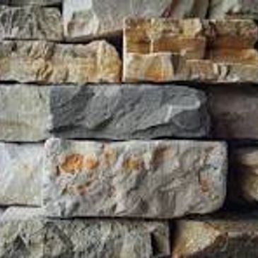 Close-up of a textured stone wall.