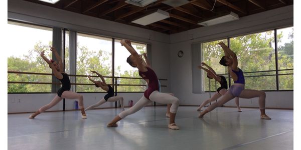 Cuizon Ballet Centre five dancers in forward lunge arched back with arms over head in fifth position