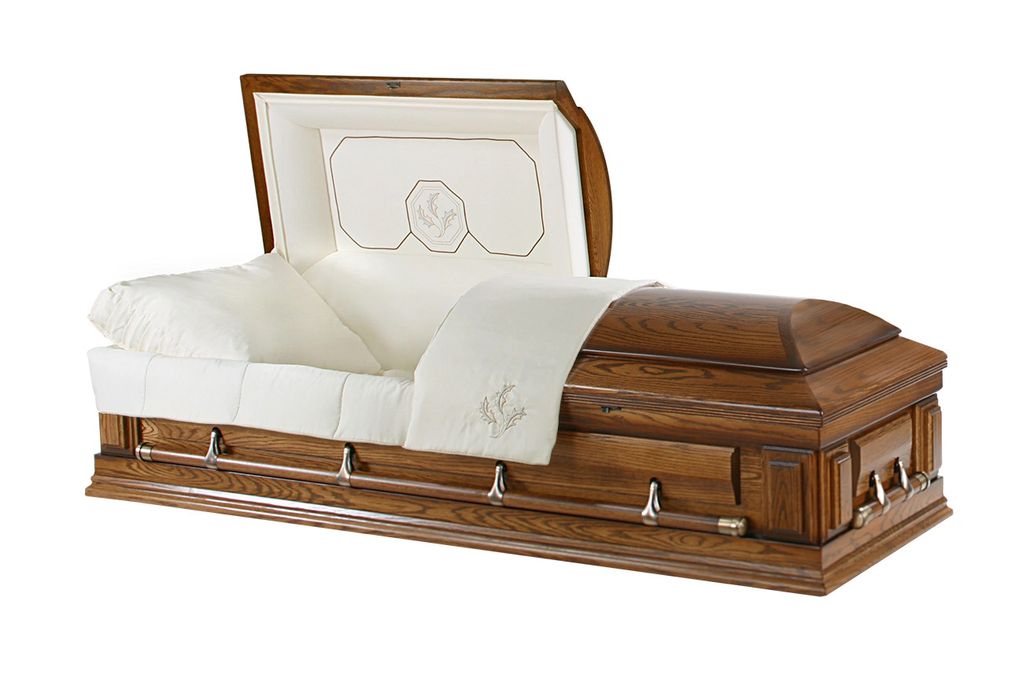 Open wooden casket with white interior lining.