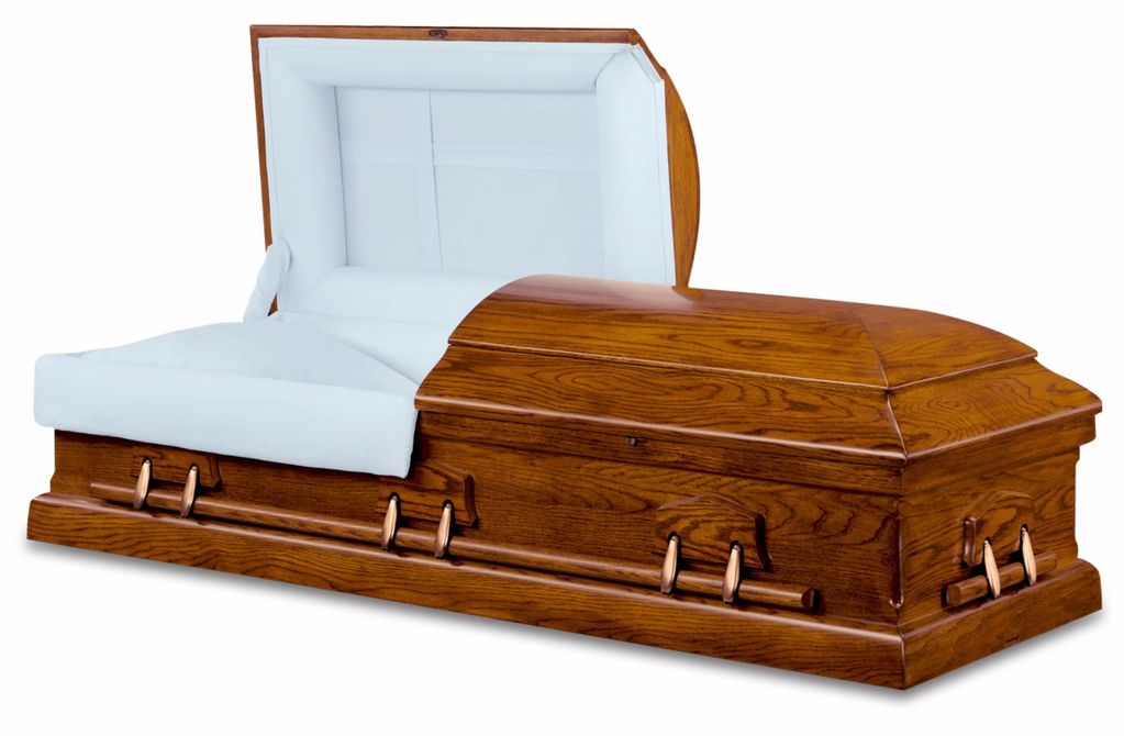 Open wooden casket with white interior.