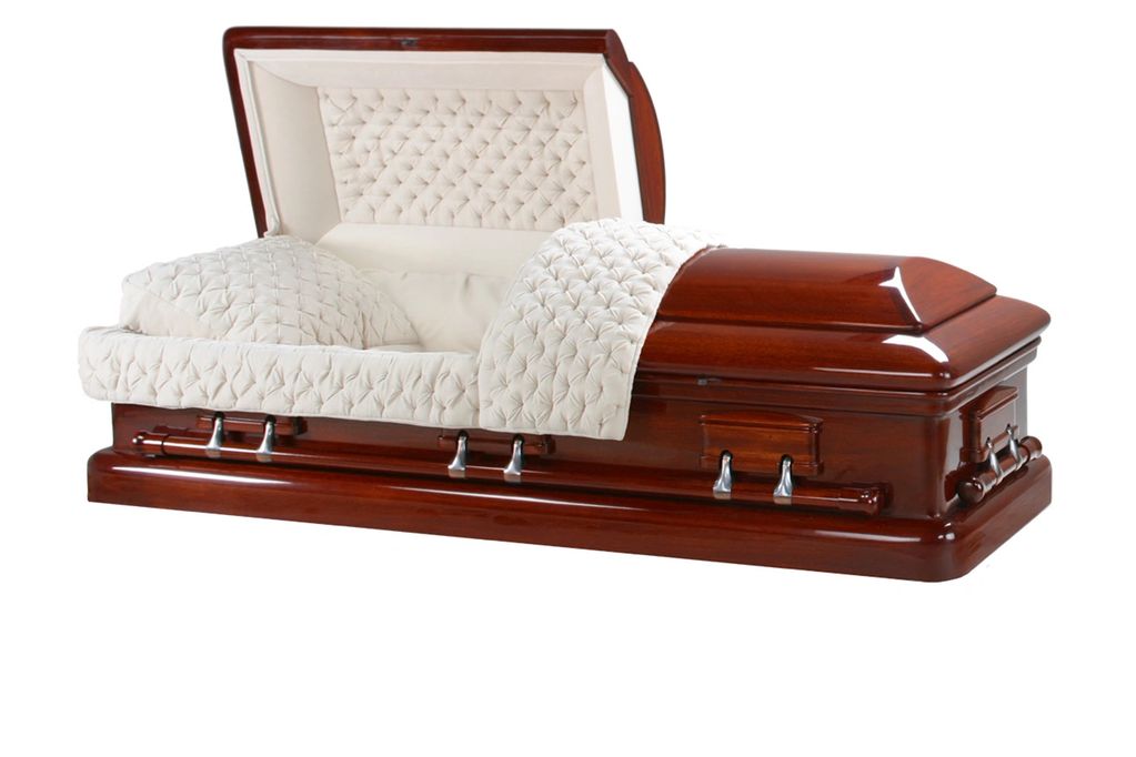 Open wooden coffin with white cushioned interior.