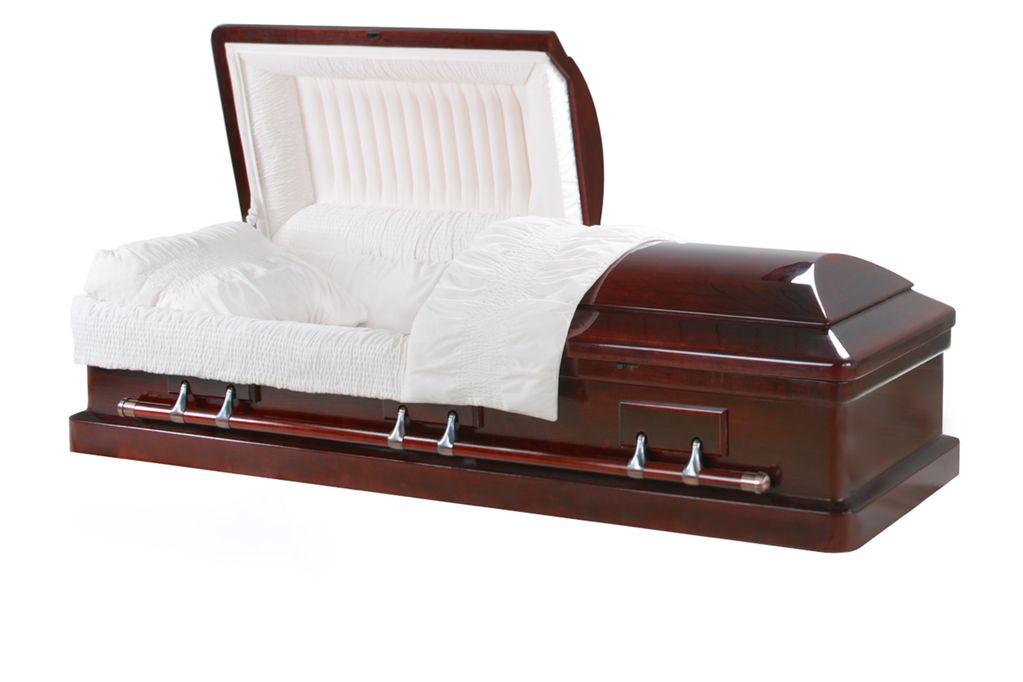 Open wooden casket with white interior lining.