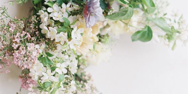 Bouquet with white, pink, purple flowers and greenery