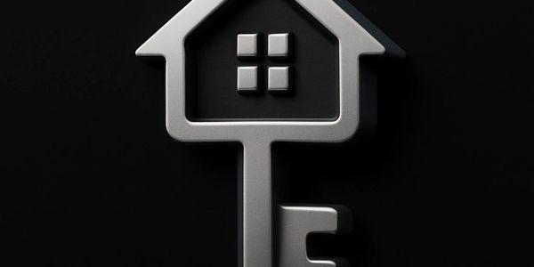 Metallic key shaped like a house with a window detail on black background.