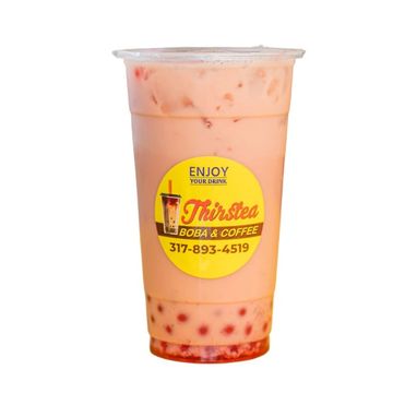 A cup of pink boba tea from Thirstea with visible tapioca pearls.