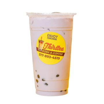 Iced boba tea from Thirstea Boba &amp; Coffee in a clear plastic cup.