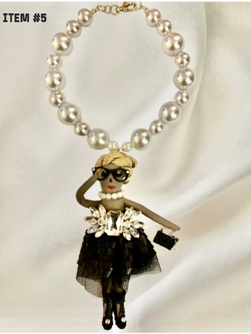 White Pearls with attached doll in evening dress. #38.