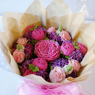 edible buttercream cupcake bouquet from Dublin bakery wrapped in cellophane and tied with a bow