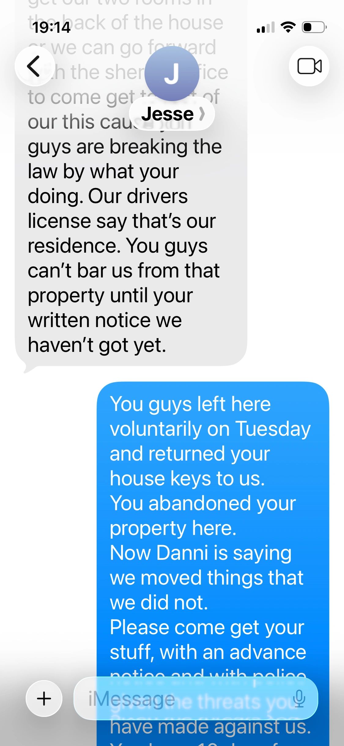 Text exchange about property dispute and legal rights between two parties.