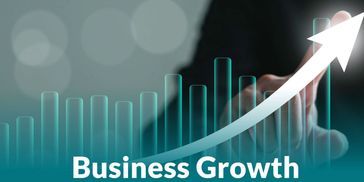 Hand pointing at rising business growth graph with upward arrow.