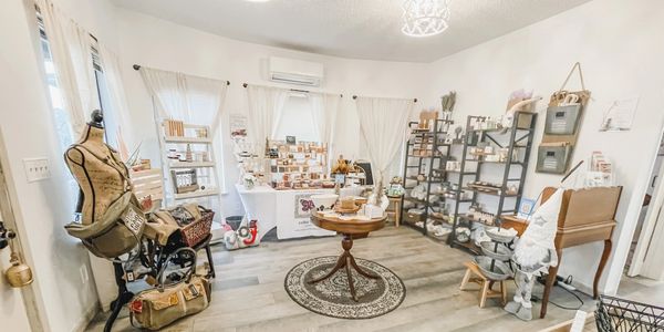 Celtic Clan Health Cottage in Tacoma. Store front with assorted gifts on shelves. Wide view of room.