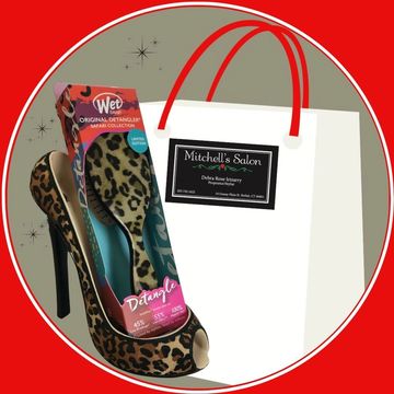 Animal Print Wet Brush in animal print high heel w/Mitchell's Salon Bethel logo on shopping bag