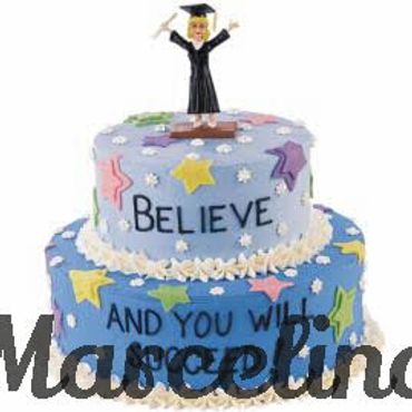 Two-tier graduation cake with stars and the message 'Believe and you will succeed'.