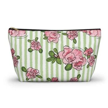 Green striped pouch with pink flowers.