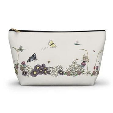 White pouch with floral and butterfly design.