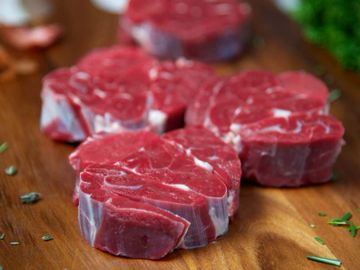 Beef Shin Rounds on wooden board. Born & reared in Malpas.