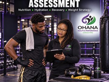 Trainer consulting athlete in gym during assessment.