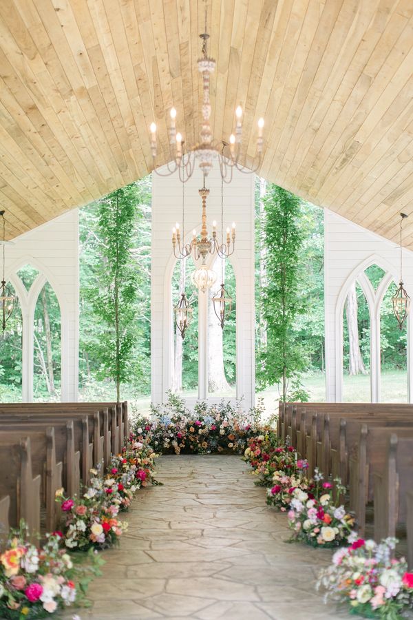 chapel ceremony, colorful wedding, colorful flowers, wedding flowers, aisle meadow, ground arch