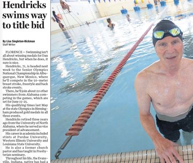 Dan Hendricks, a swimmer, prepares at the pool for a 50-meter breaststroke event.