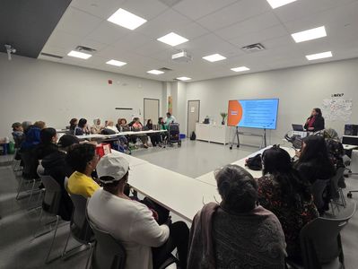 Group of older adults participating in an interactive brain health workshop facilitated by Dr Gupta